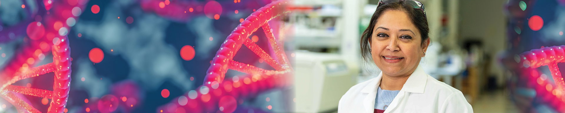 A genetics student poses in a lab