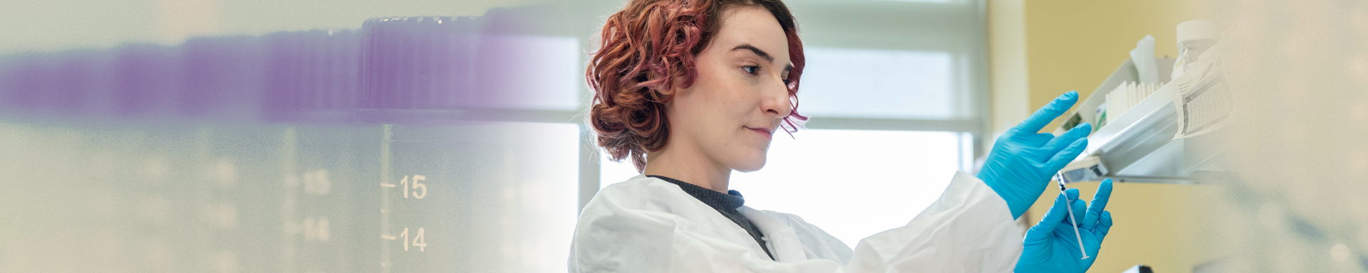 A researcher using medical equipment