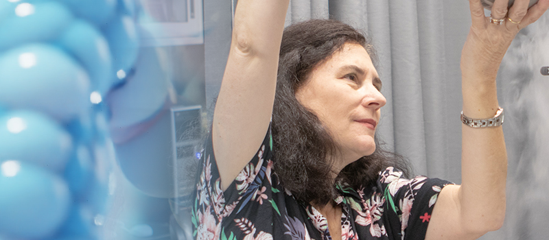 Professor performing experiment for dual degree programs