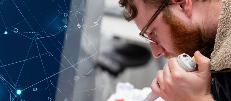 A student works a microscope